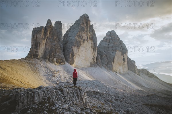 Italy, South Tirol, Sexten Dolomites, Tre Cime di Lavaredo, Man looking at rock formations