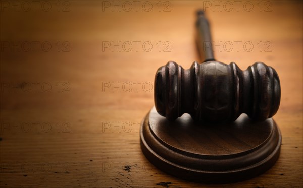 Gavel on wooden background