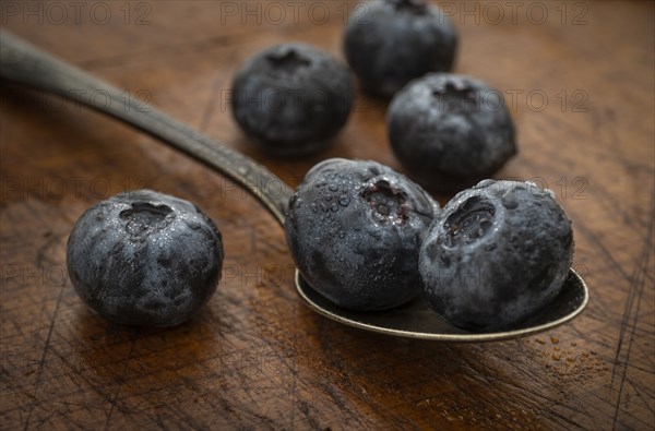 Blueberries on spoon