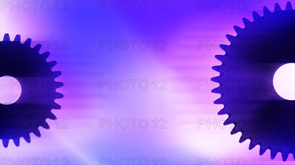 Cog wheels on purple background