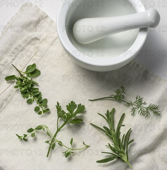 Herbs with mortar and pestle