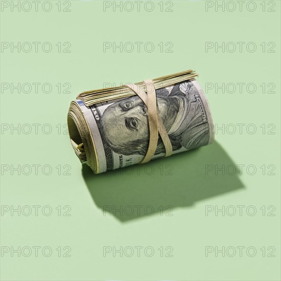 Roll of US dollar bills