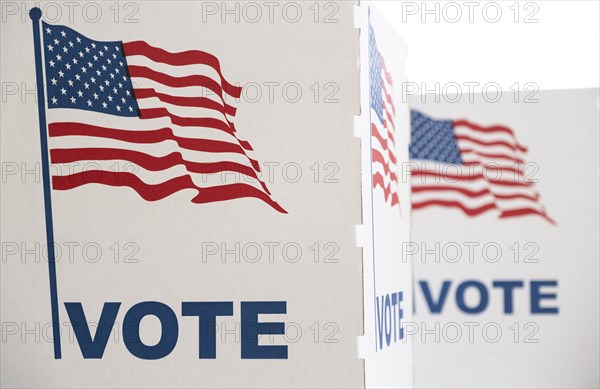 Voting booth with US flag