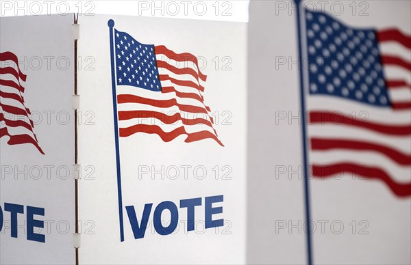 Voting booth with US flag