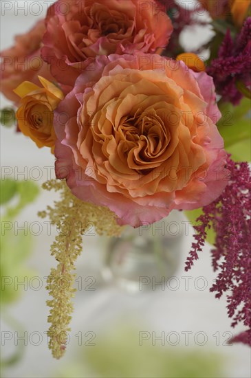 Floral arrangement with pink roses