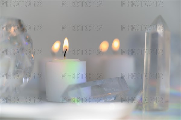 Composition of burning candles and crystals