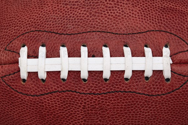 Close up of laces on american football ball