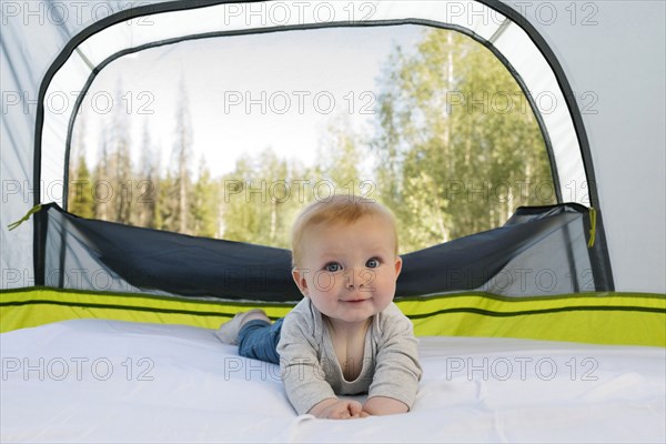 USA, Utah, Uinta National Park, Portrait of baby boy (6-11 months ) in tent