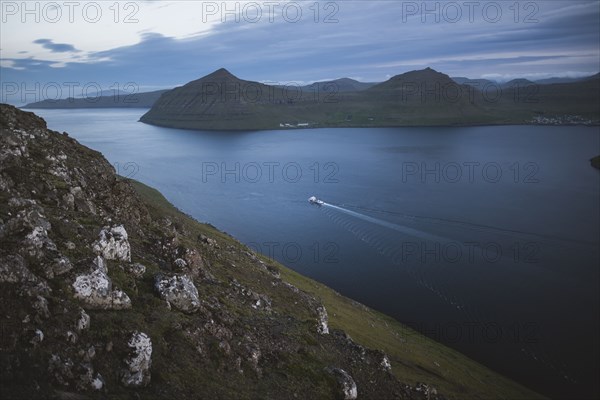 Denmark, Faroe Islands, Klaksvik, Boat in fjord