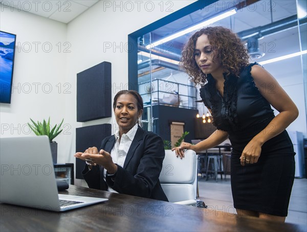 Two businesswomen working in office