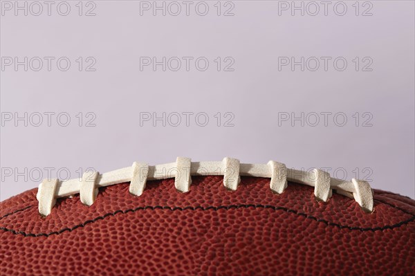 Close-up of football ball laces