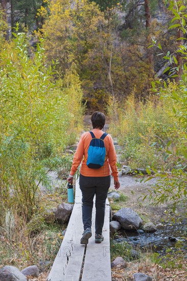 Woman hiking in Bandelier National Monument