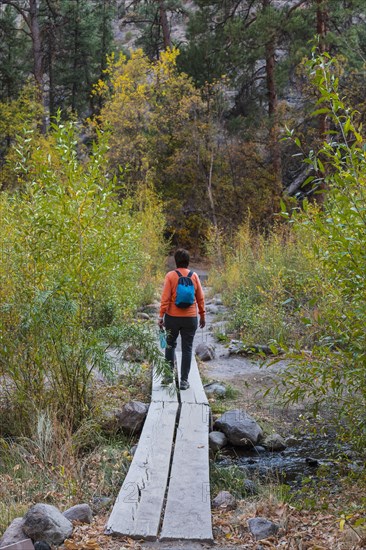 Woman hiking in Bandelier National Monument