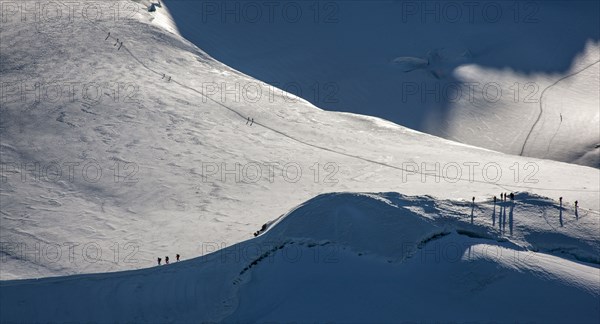 Climbers on mountain ridge at Monte Rosa Massif
