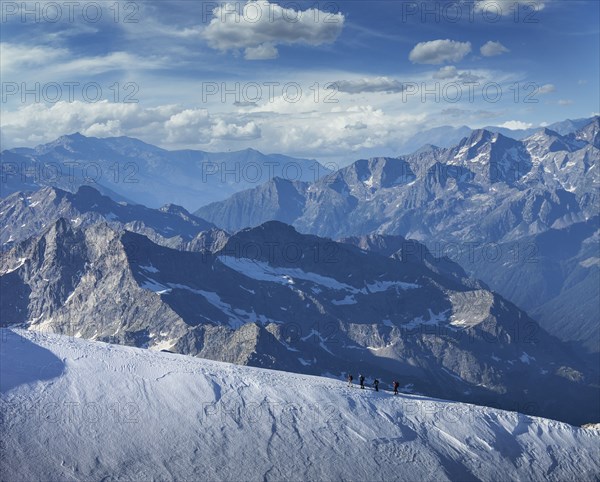 Climbers on mountain ridge at Monte Rosa Massif