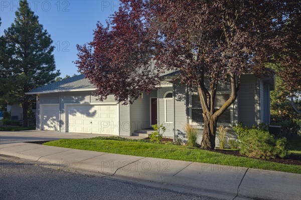 Exterior of single family home on sunny morning