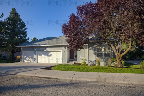 Exterior of single family home on sunny morning