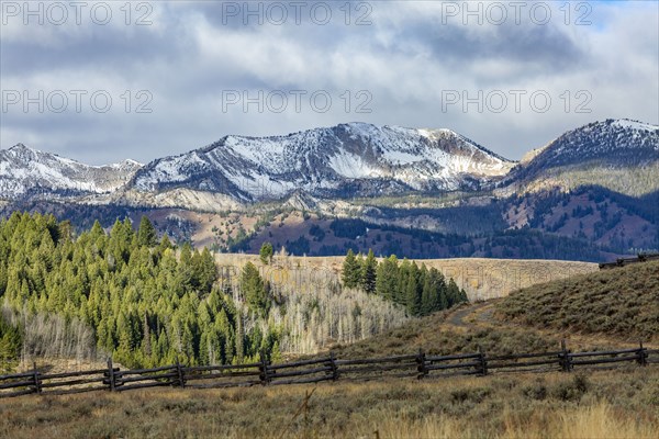 Ranch landscape with mountains and forests