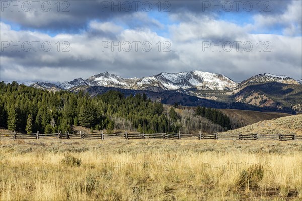 Ranch landscape with mountains and forests