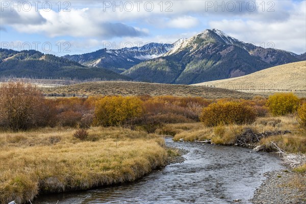 Landscape with stream and mountains