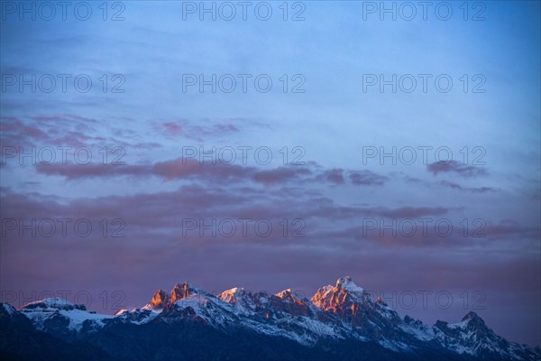 Sunset light on peaks of Teton Range in Grand Teton National Park