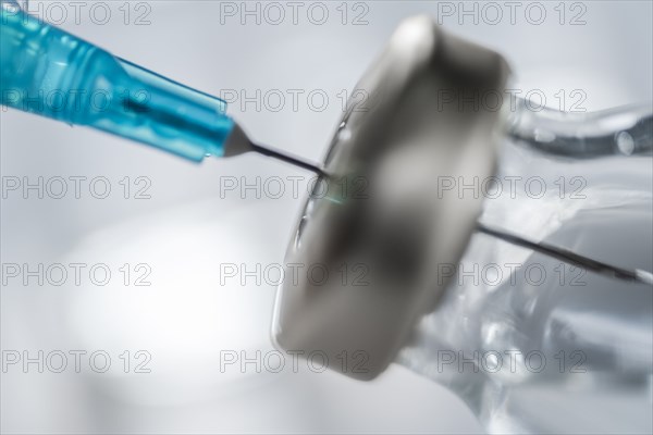 Close-up of Covid-19 vaccine and syringe