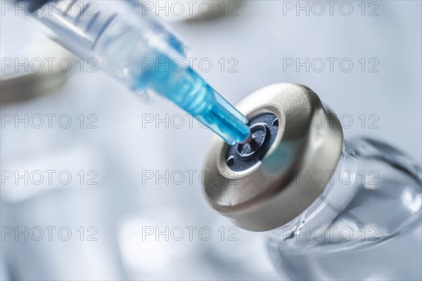 Close-up of Covid-19 vaccine and syringe