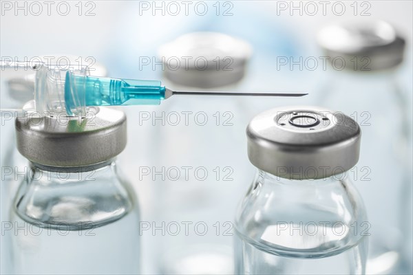 Close-up of Covid-19 vaccine and syringe
