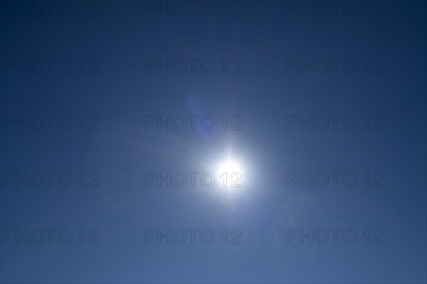 Sun on blue sky