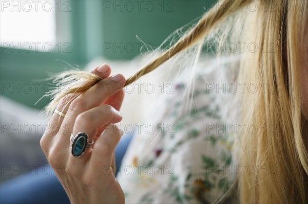 Woman touching her hair