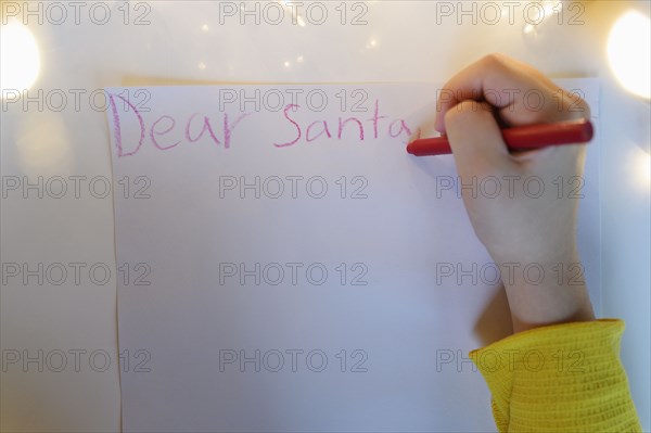 Hand writing letter to Santa Claus