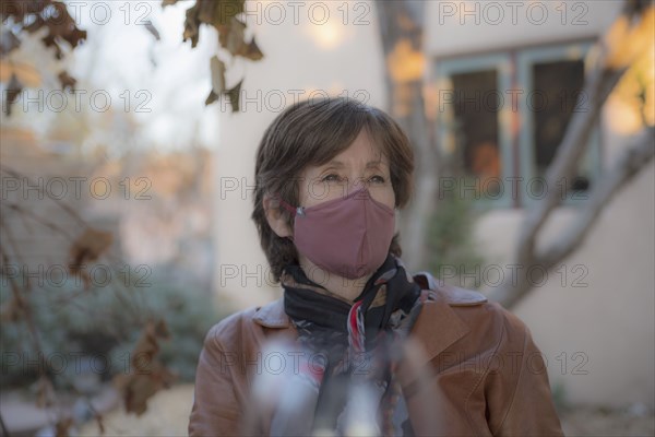 Portrait of woman wearing protective face mask