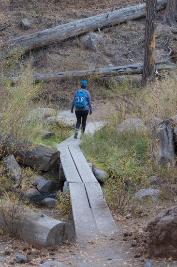 Hiker visiting Bandelier National Monument