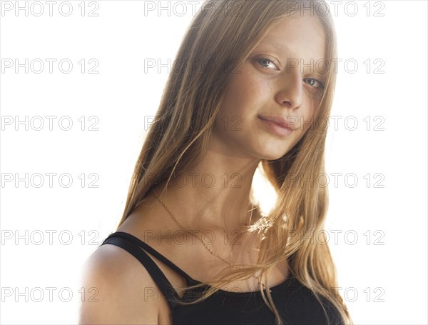 Wind blowing hair of Caucasian teenage girl