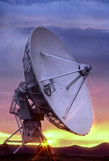 Radio telescope at Karl G. Jansky Very Large Array at sunset