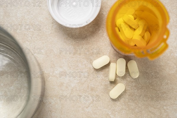 Overhead view of pills in prescription bottle