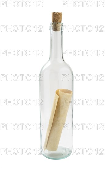 Studio shot of glass bottle with message inside