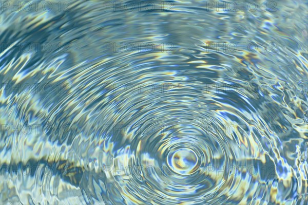 Concentric ripples on water surface