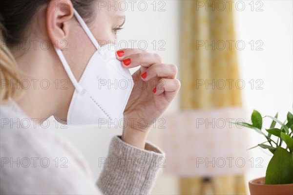 Close-up of woman in face mask