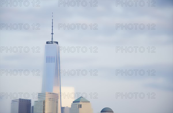 Downtown skyscrapers with One World Trade Center against sky