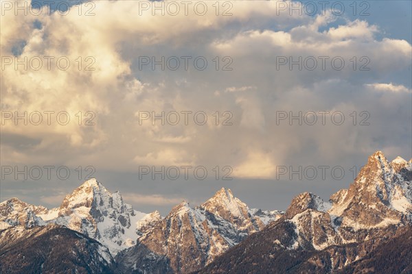 Snow covered Teton mountains at sunrise