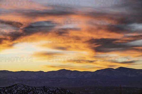 Colorful sunset sky over Galisteo Basin Preserve landscape