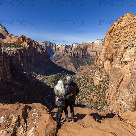 Senior couple looking over Zion Canyon in Zion National Park