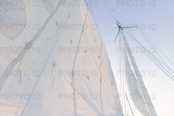 Low angle view of sailing mast