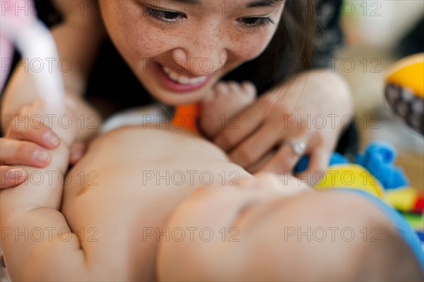 Close up of mother and baby daughter