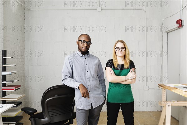 Portrait of business partners in design office