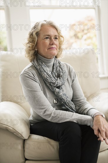 Portrait of contented senior woman at home