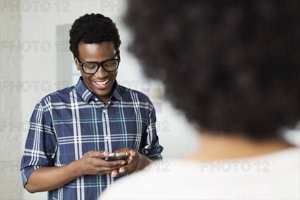 Young man using cell phone