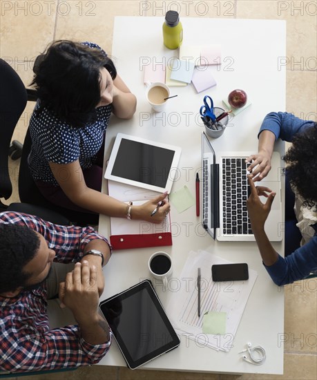 Colleagues having meeting in Small Business