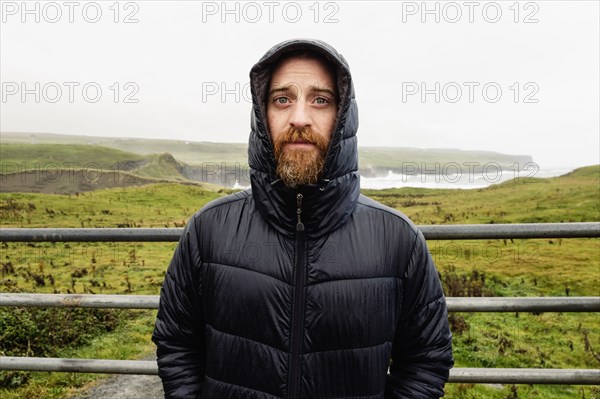 Mid adult man wearing winter coat